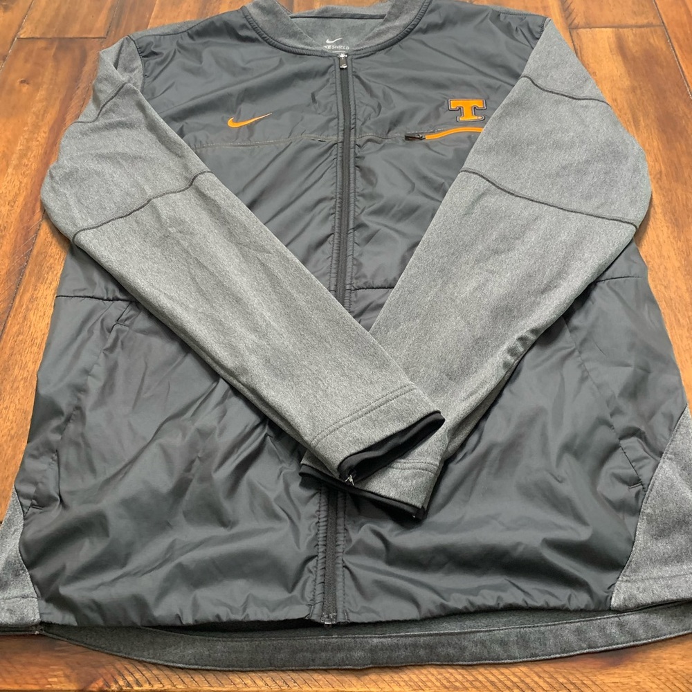 A Tennessee Vols Nike zip-up jacket.